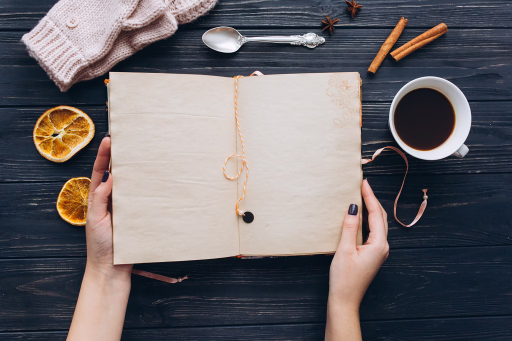 notebook-of-memories-with-camera-and-coffee-on-wooden-vintage-table--1024x682 Café Pode Melhorar a Memória? A Ciência por Trás da Bebida que Desperta a Mente