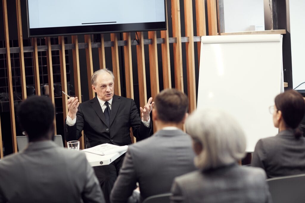owner-of-company-talking-expressively-at-meeting-1024x682 Toda a Cadeia de Sustentabilidade do Café: Transformando o Futuro da Cafeicultura Brasileira